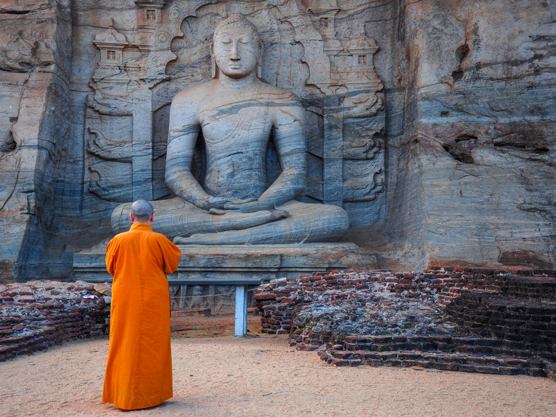 17___Sri_Lanka__Unique_monolith_Buddha_statue_in_Polonnaruwa_temple___capital_of_Ceylon__UNESCO_World_Heritage_Site